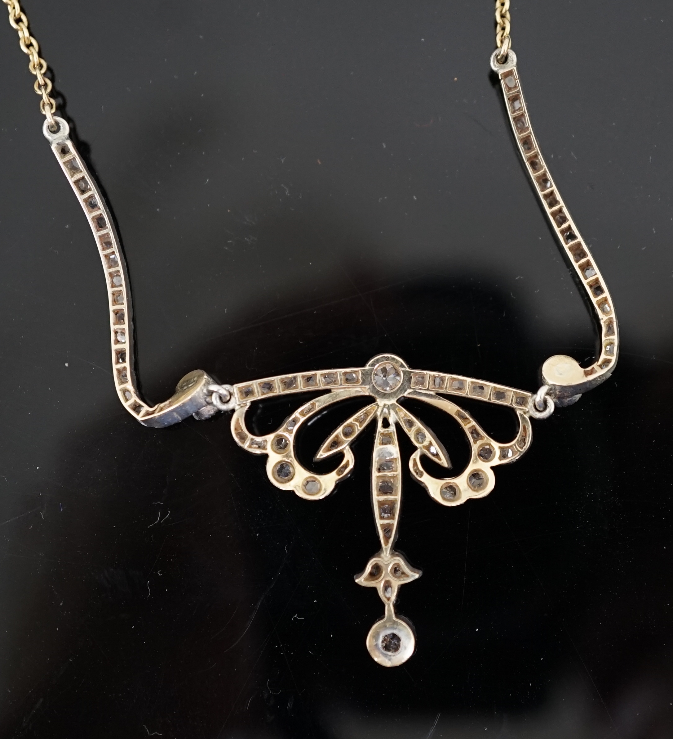 A Belle Epoque gold and silver, round and rose cut diamond cluster set pendant necklace